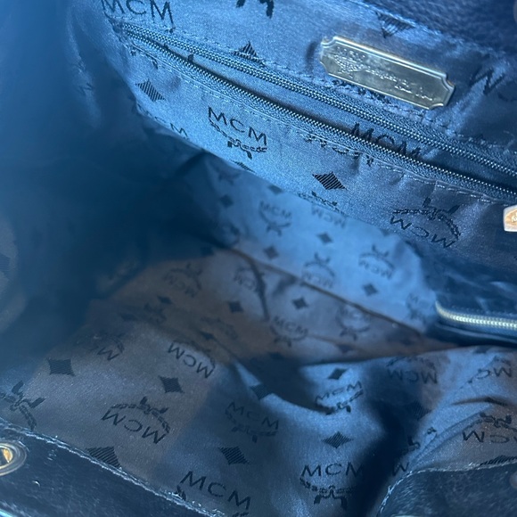 MCM Black Leather Drawstring Shoulder Backpack with Gold Accents - Picture 11 of 11